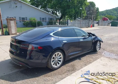 2014 Tesla Model S P85 z USA, uszkodzony, nr VIN 5YJSA1H17EFP65983